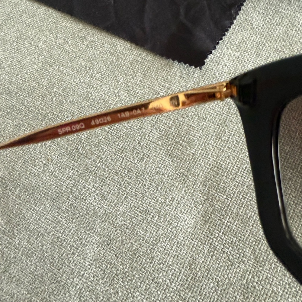 Prada Women's Sunglasses in Black with Gold Detail - Picture 5 of 6